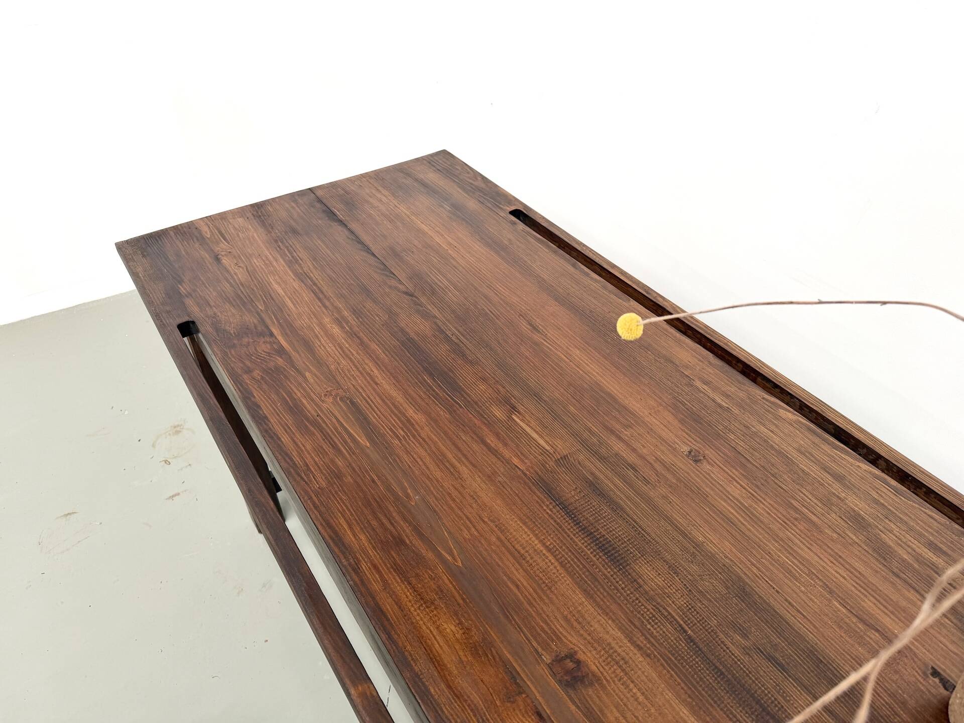 Solid pine workbench, grooved top, satin brown finish.