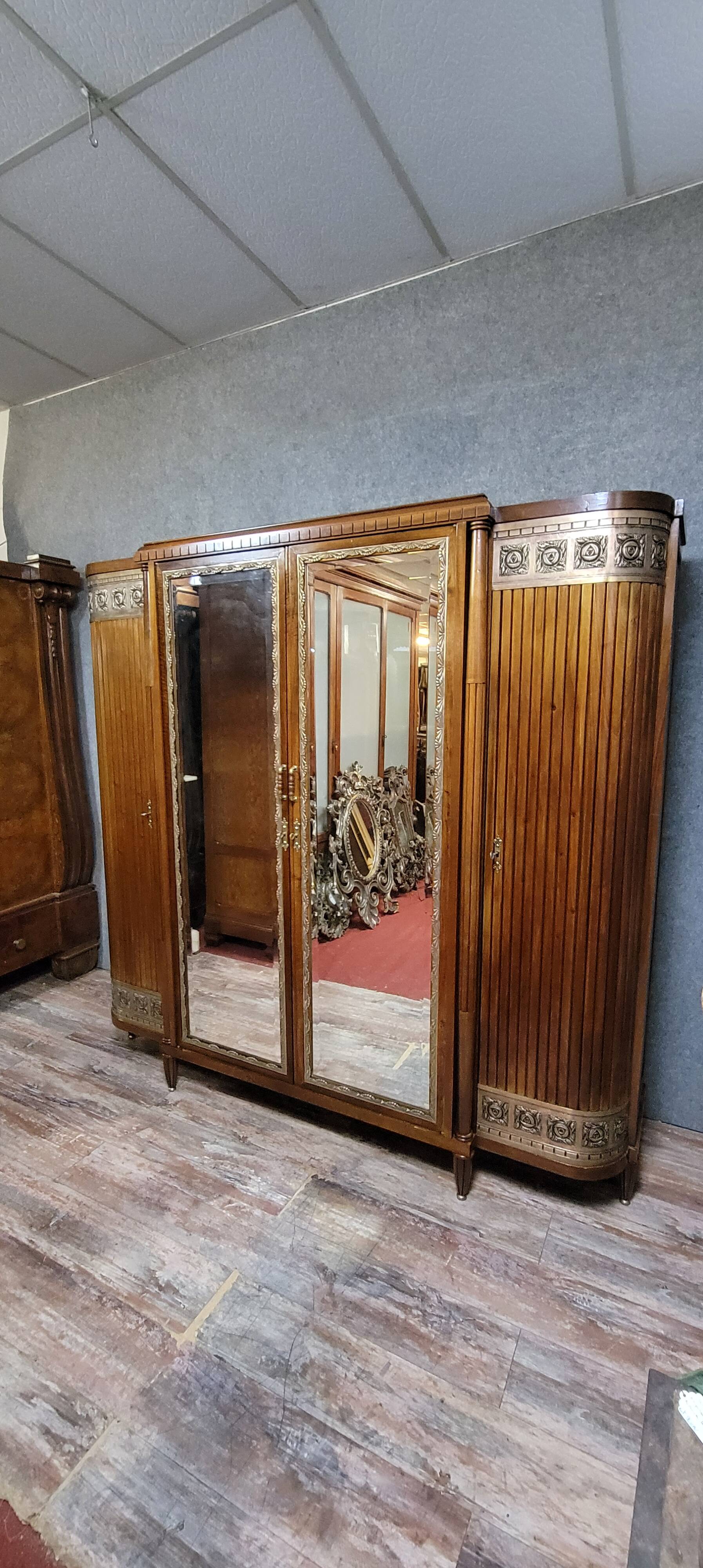 Large Art Deco bookcase wardrobe in mahogany and bronze.