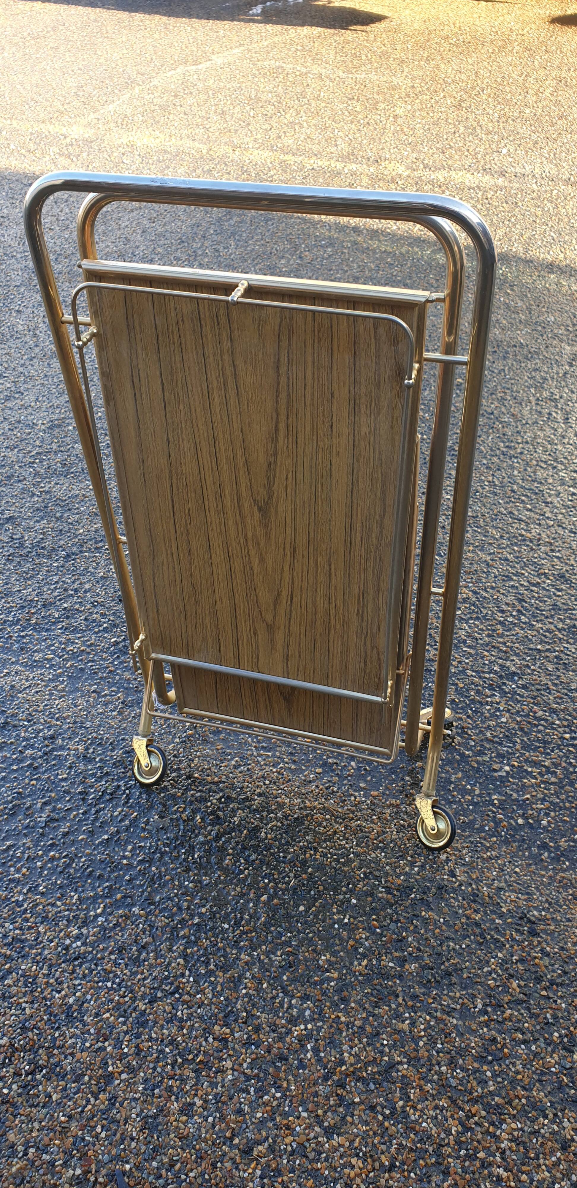 Vintage folding serving table on wheels