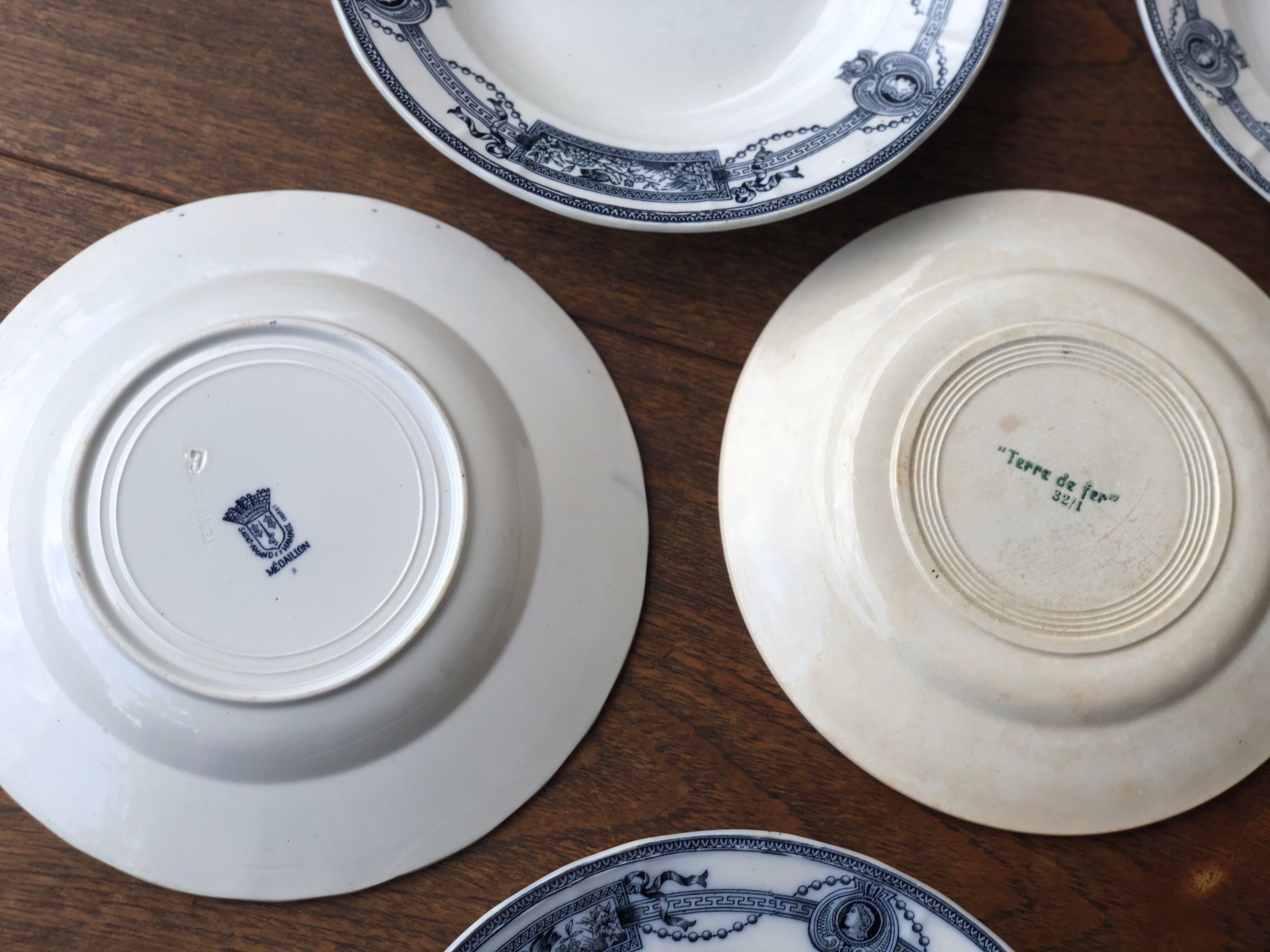 Lot of 7 plates old iron land of saint Amand hamage north model medallion