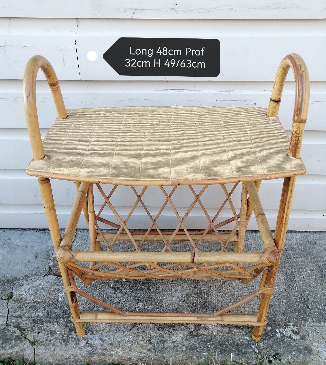 Rattan table at the end of the sofa