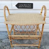 Rattan table at the end of the sofa