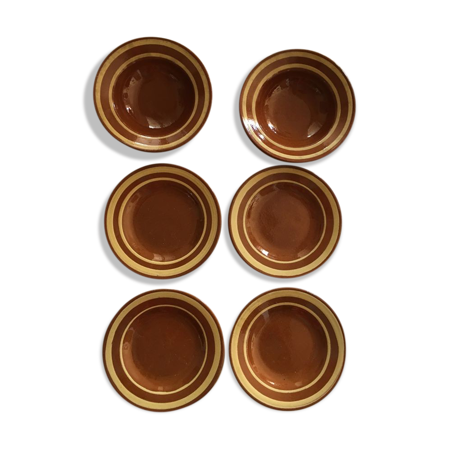 Together six years 70 terracotta plates