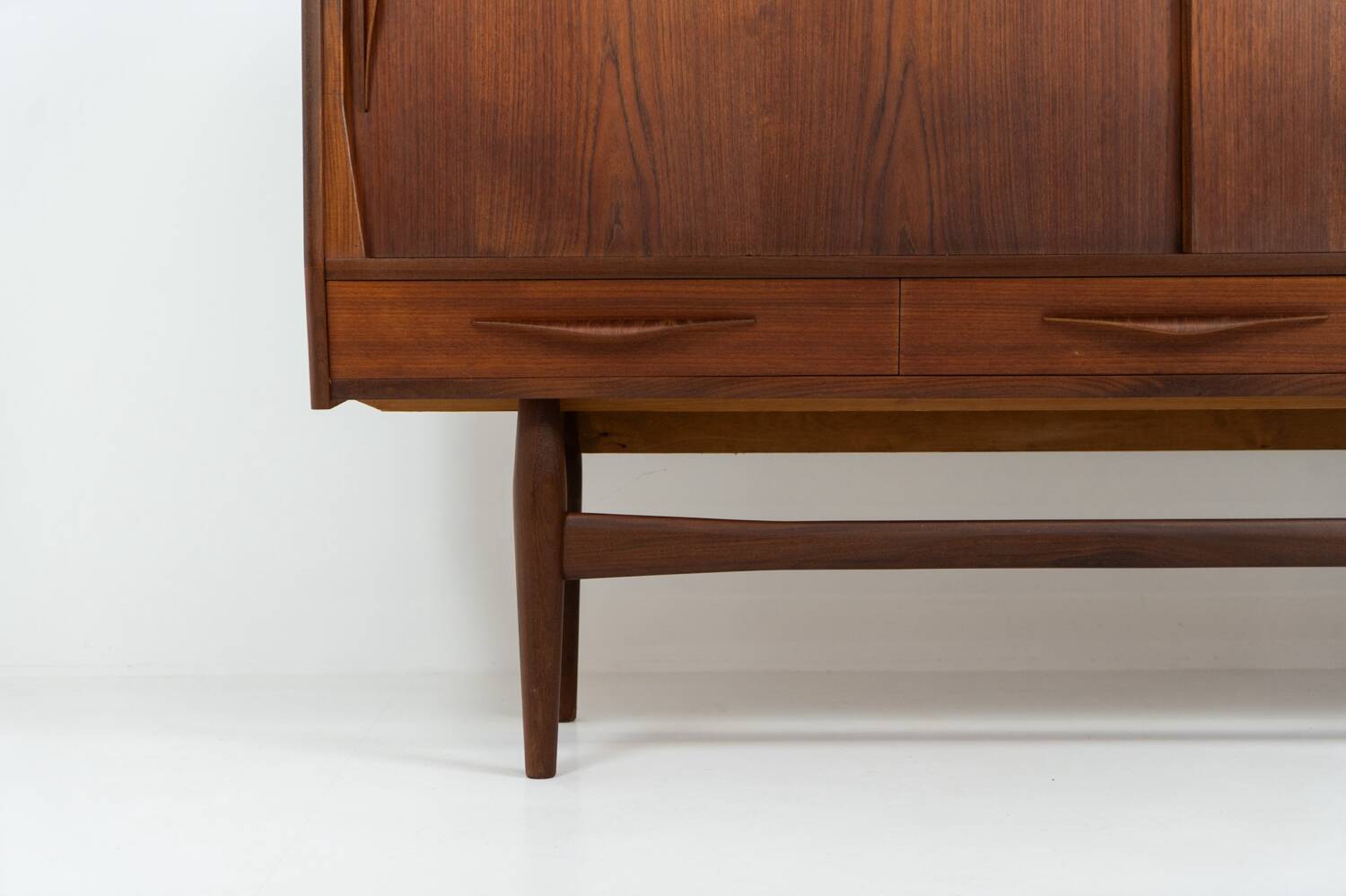 Teak highboard by Jensen & Mølholm (Denmark, 1960s).
