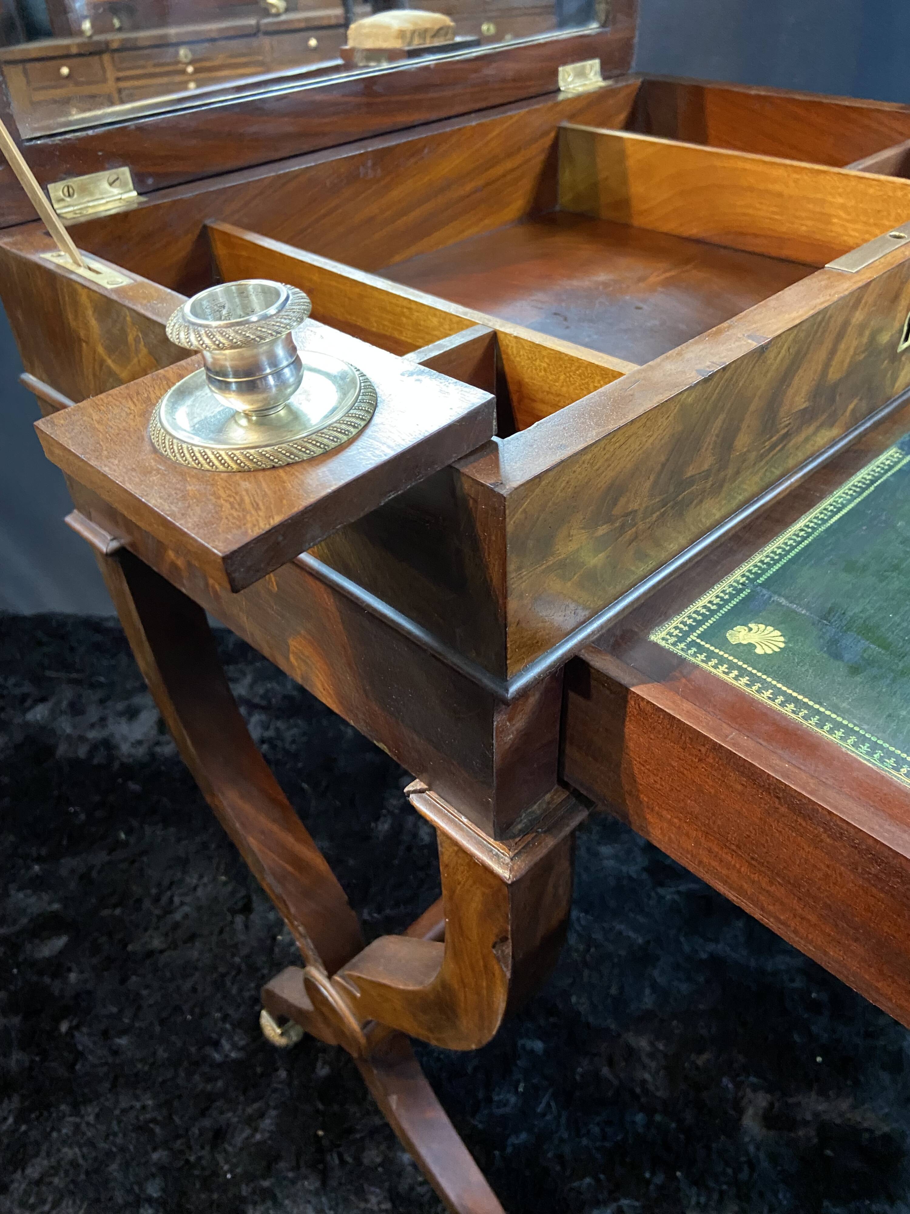 Louis-Philippe period mahogany writing desk with candlestick, 19th century