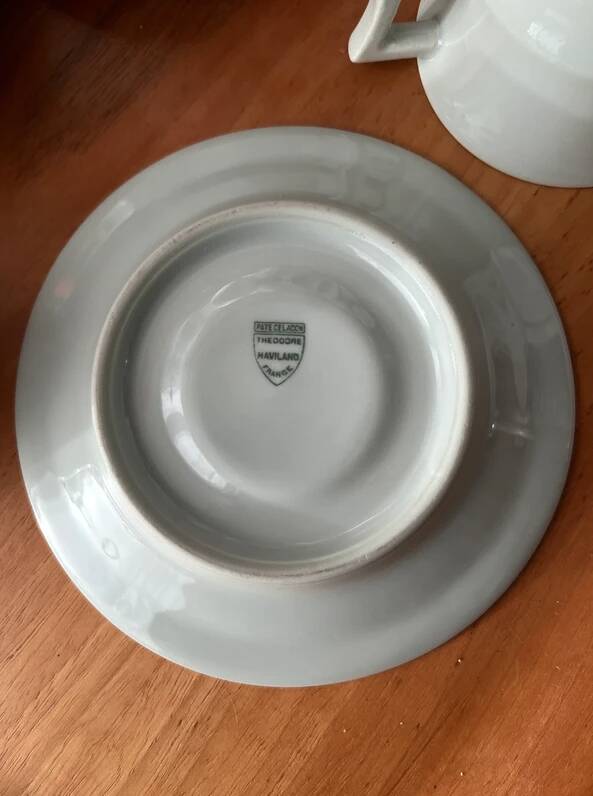 Art Deco cups and saucers by Théodore Haviland in celadon.