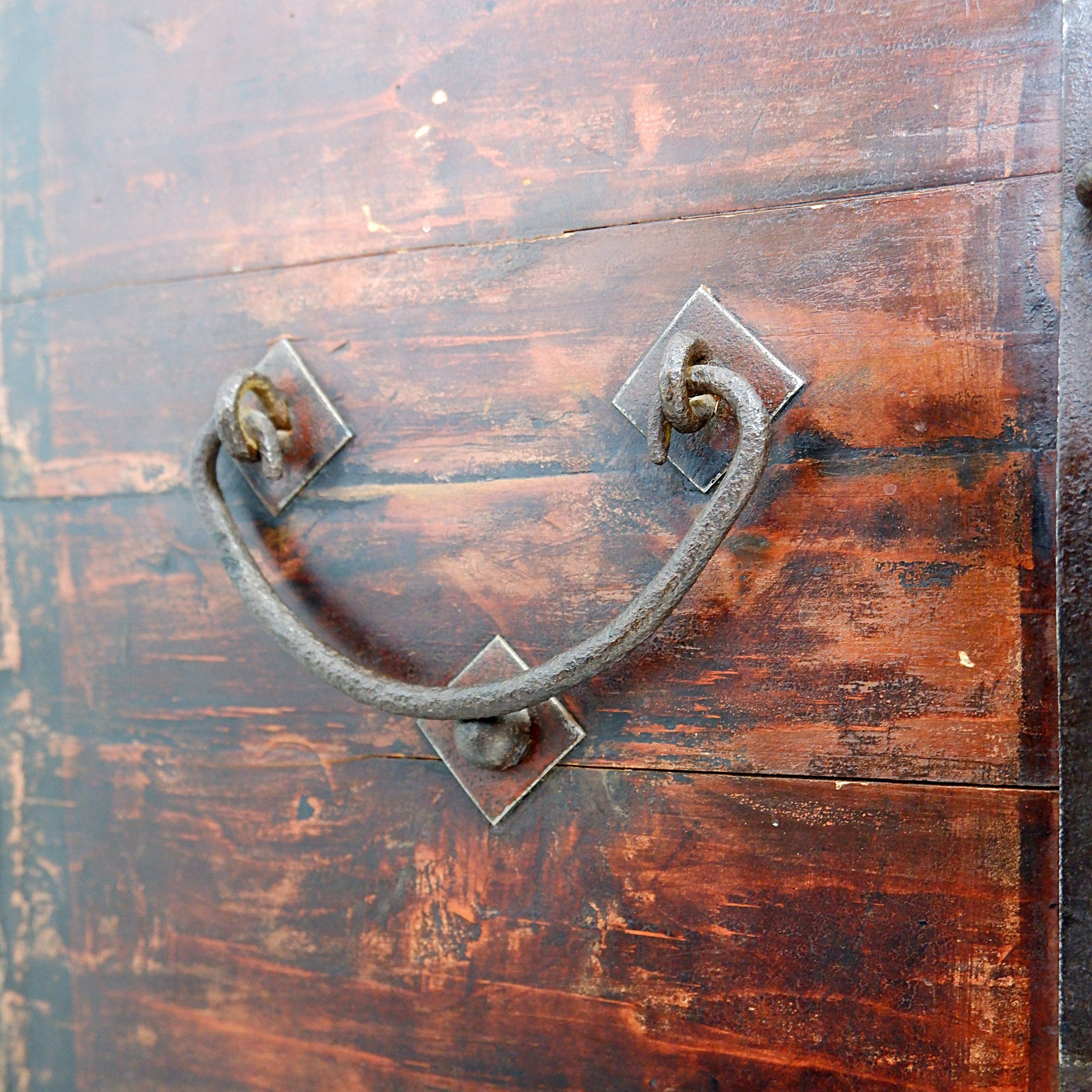 Ancient Japanese chest made of wood and iron.