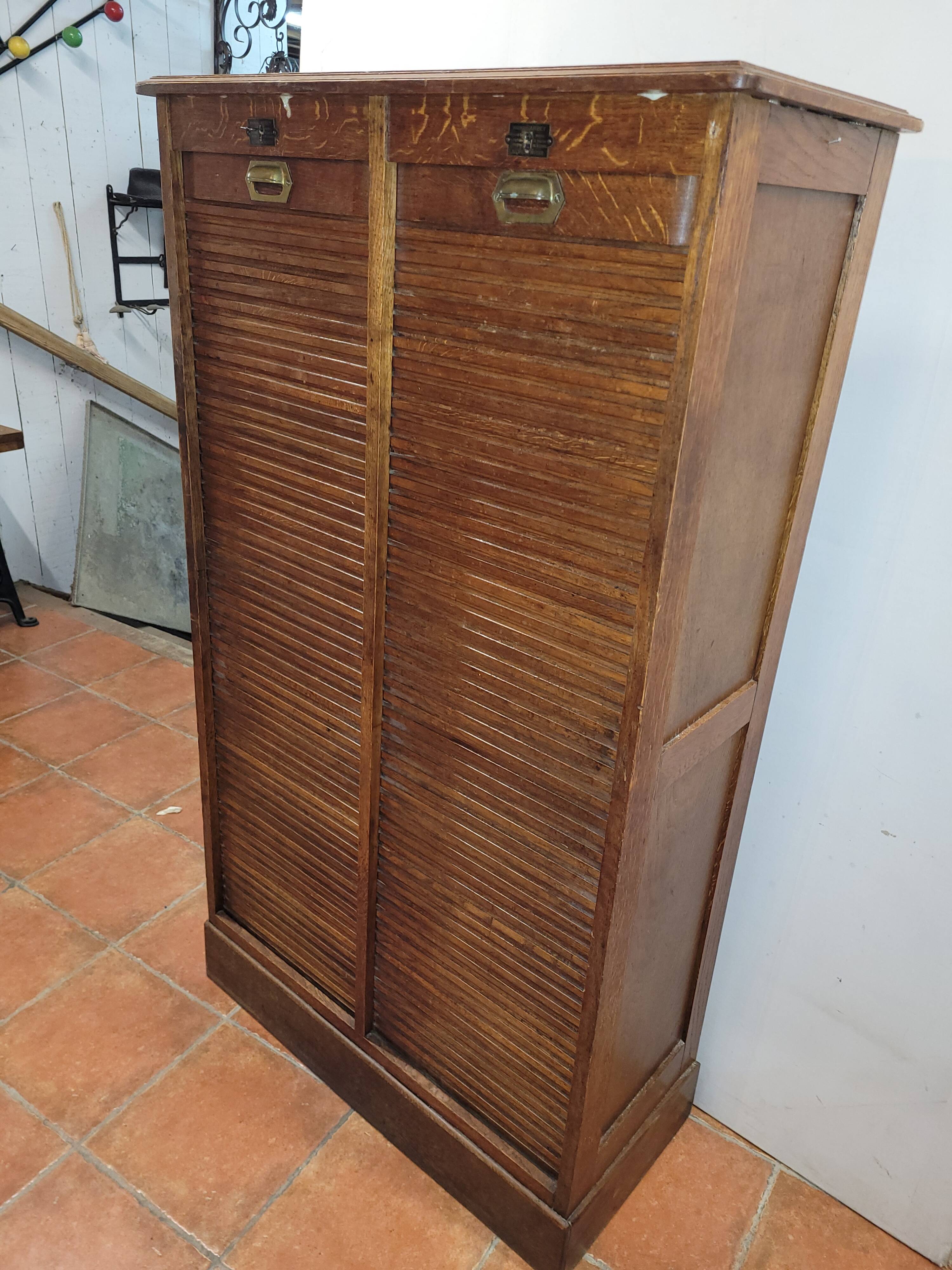 Old double curtained oak filing cabinet
