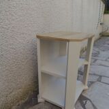 Beige vintage side tables, wooden tops.