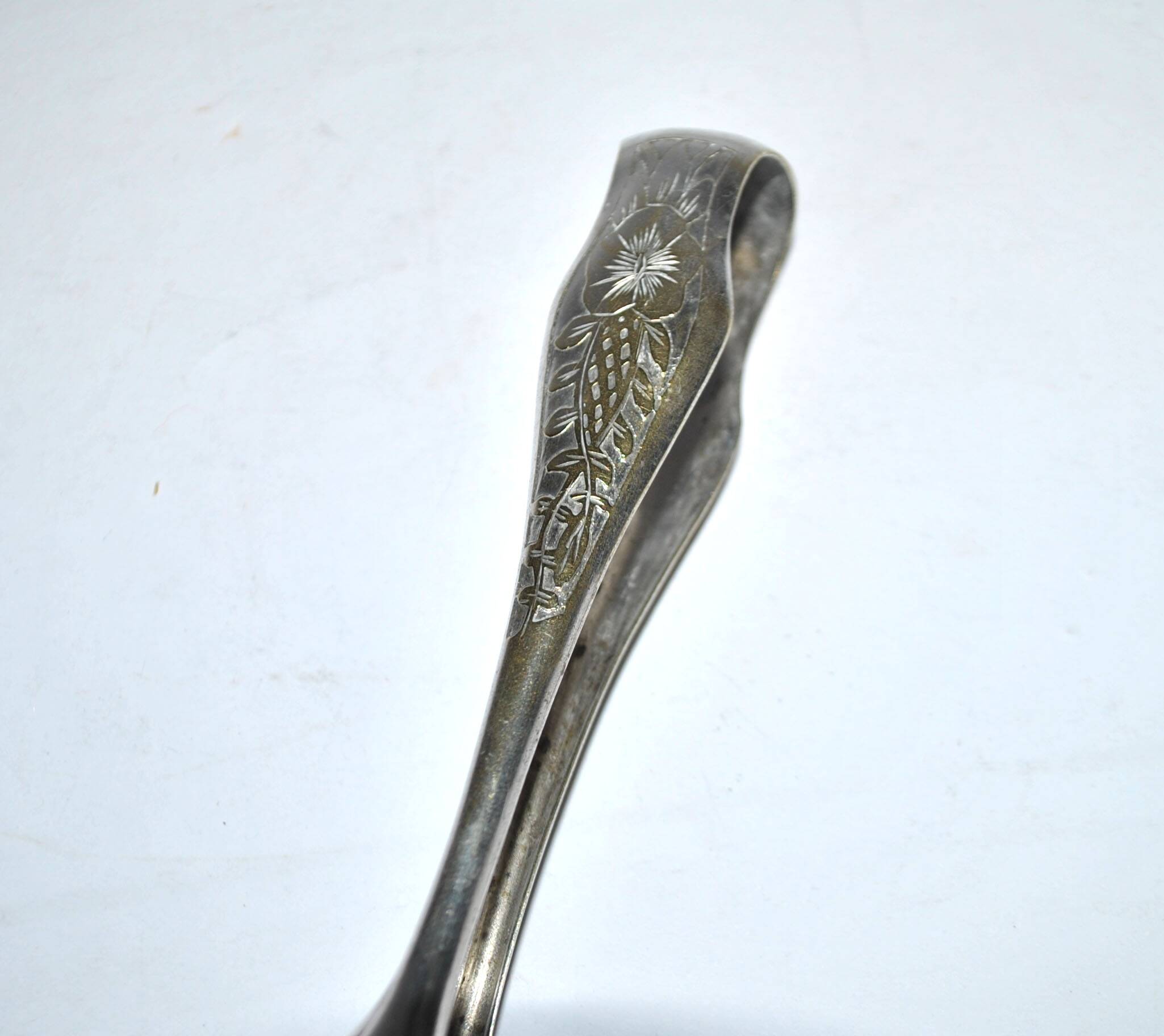 Pince à sucre en métal argenté vintage