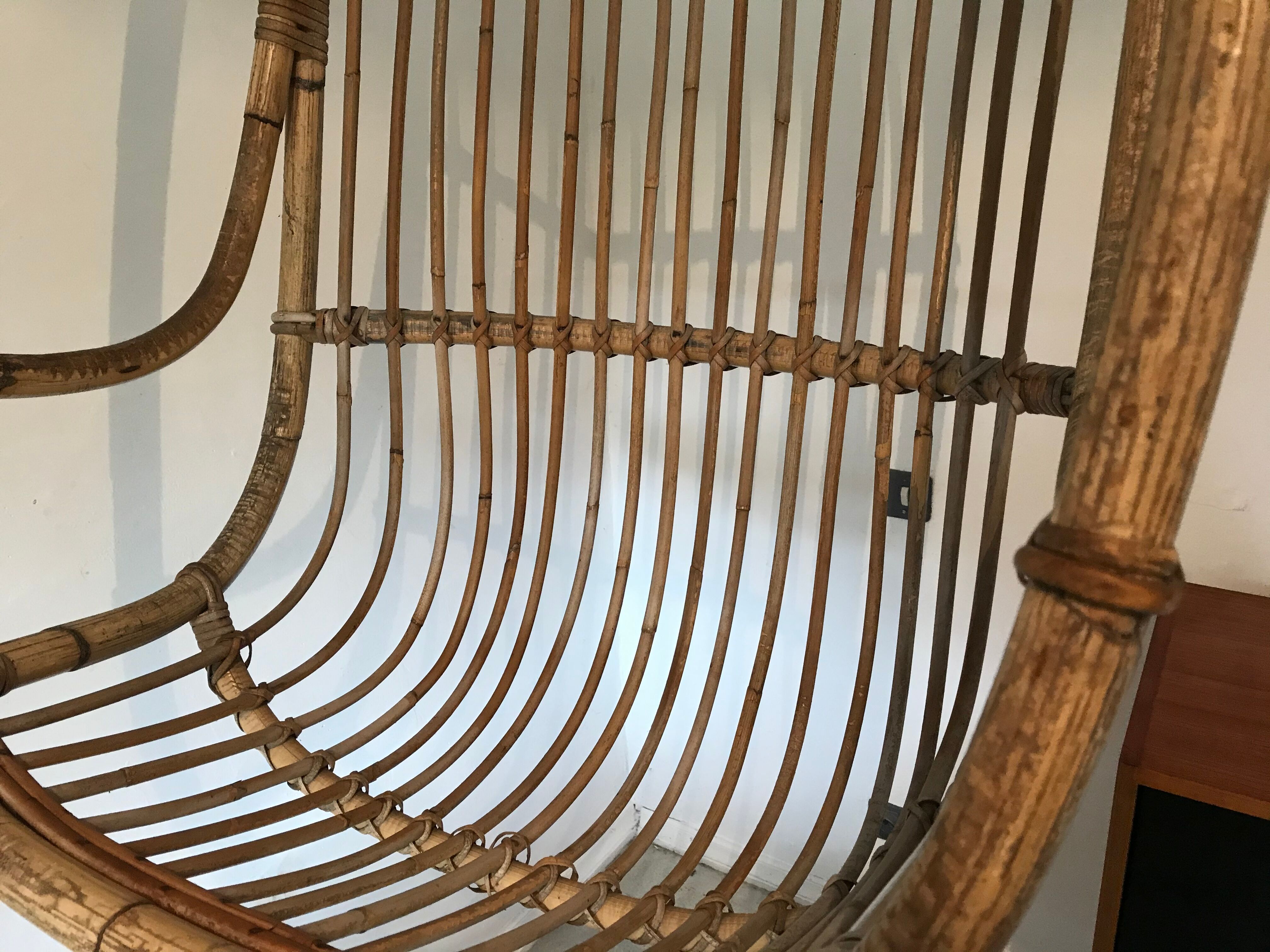 Vintage chair suspended in rattan