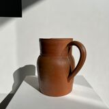Handmade stoneware pitcher below H: 20cm
