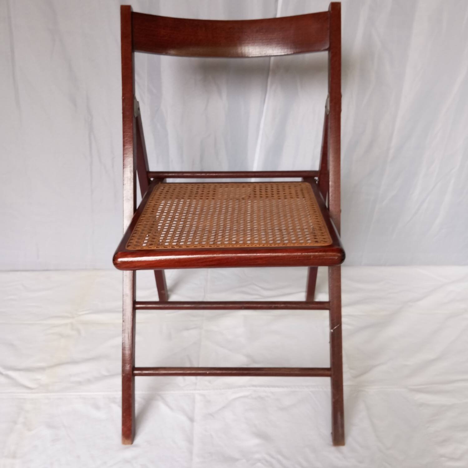 Folding wooden and cane chairs