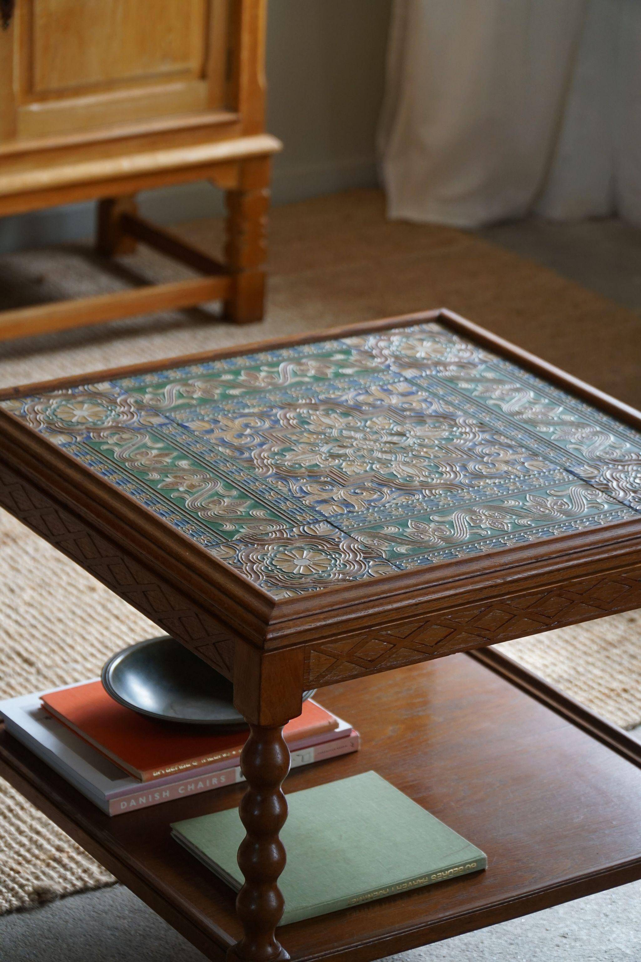 Modern Danish service table with turned spool legs and coloured tiles, 1950s.
