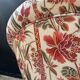 Fauteuil crapaud satin fleuri ancien