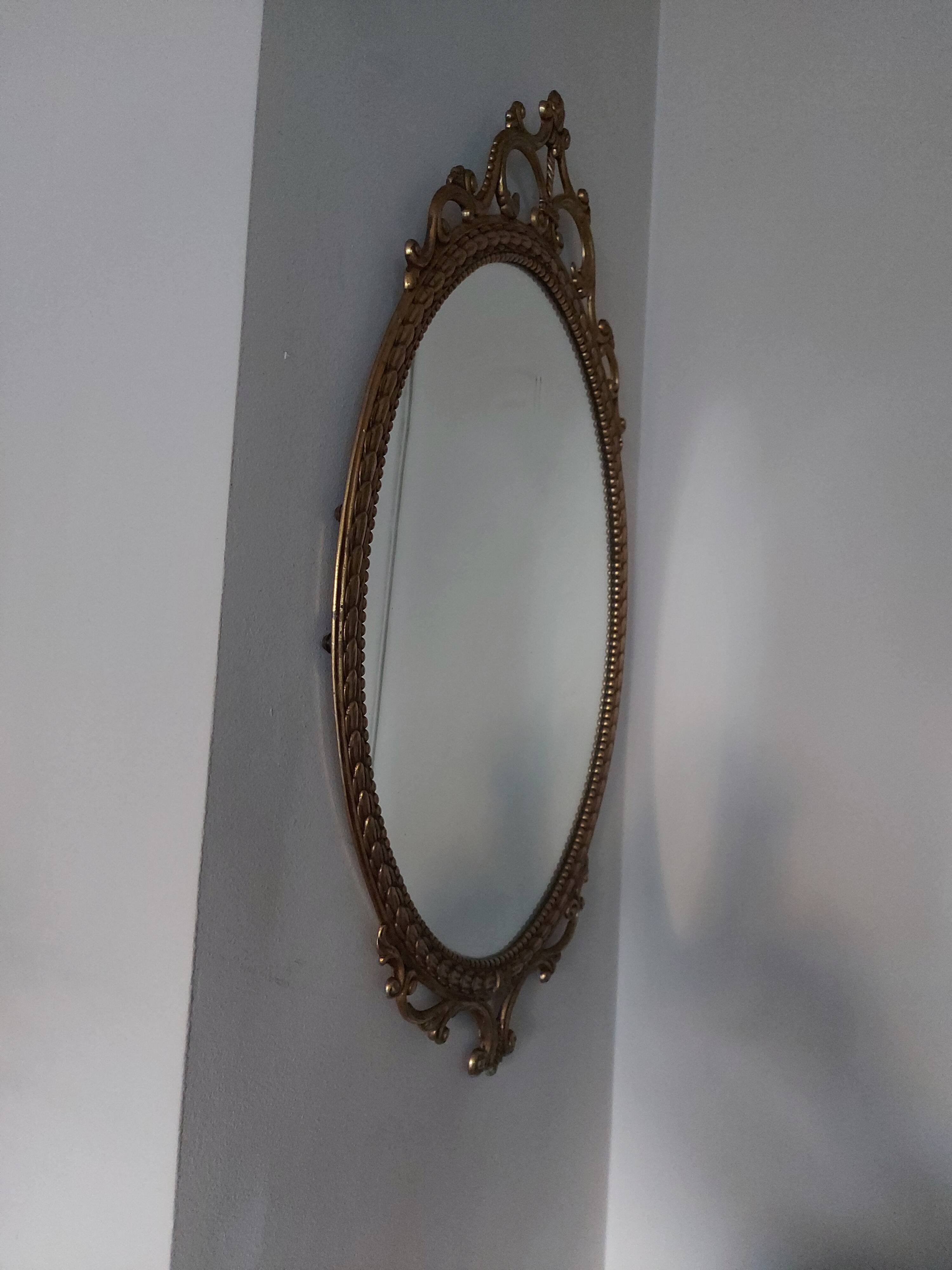 Baroque mirror in gilded brass, C.G.R