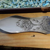 Filled silver pie shovel