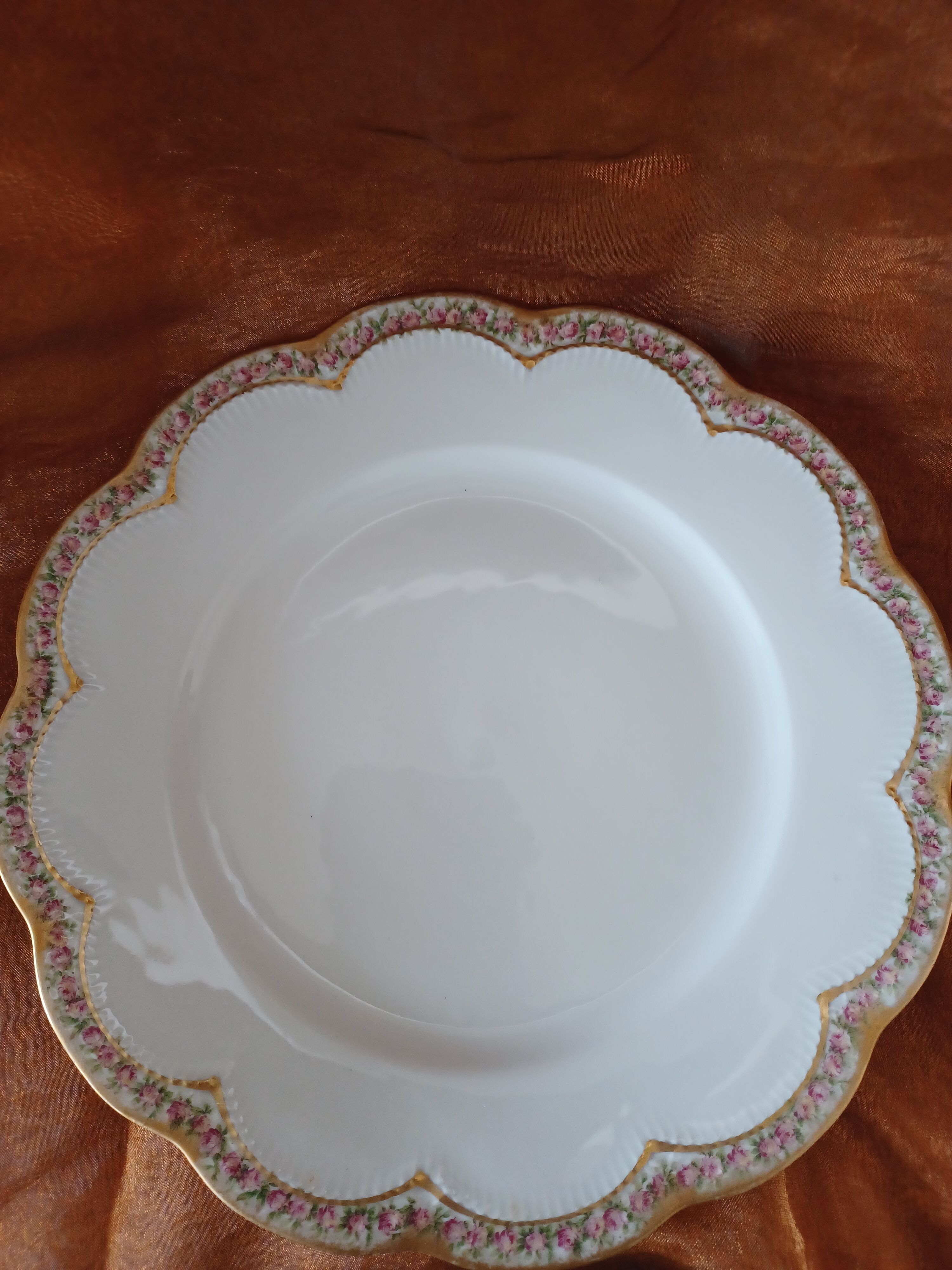 Haviland porcelain plate, contour decorations in floral garland.