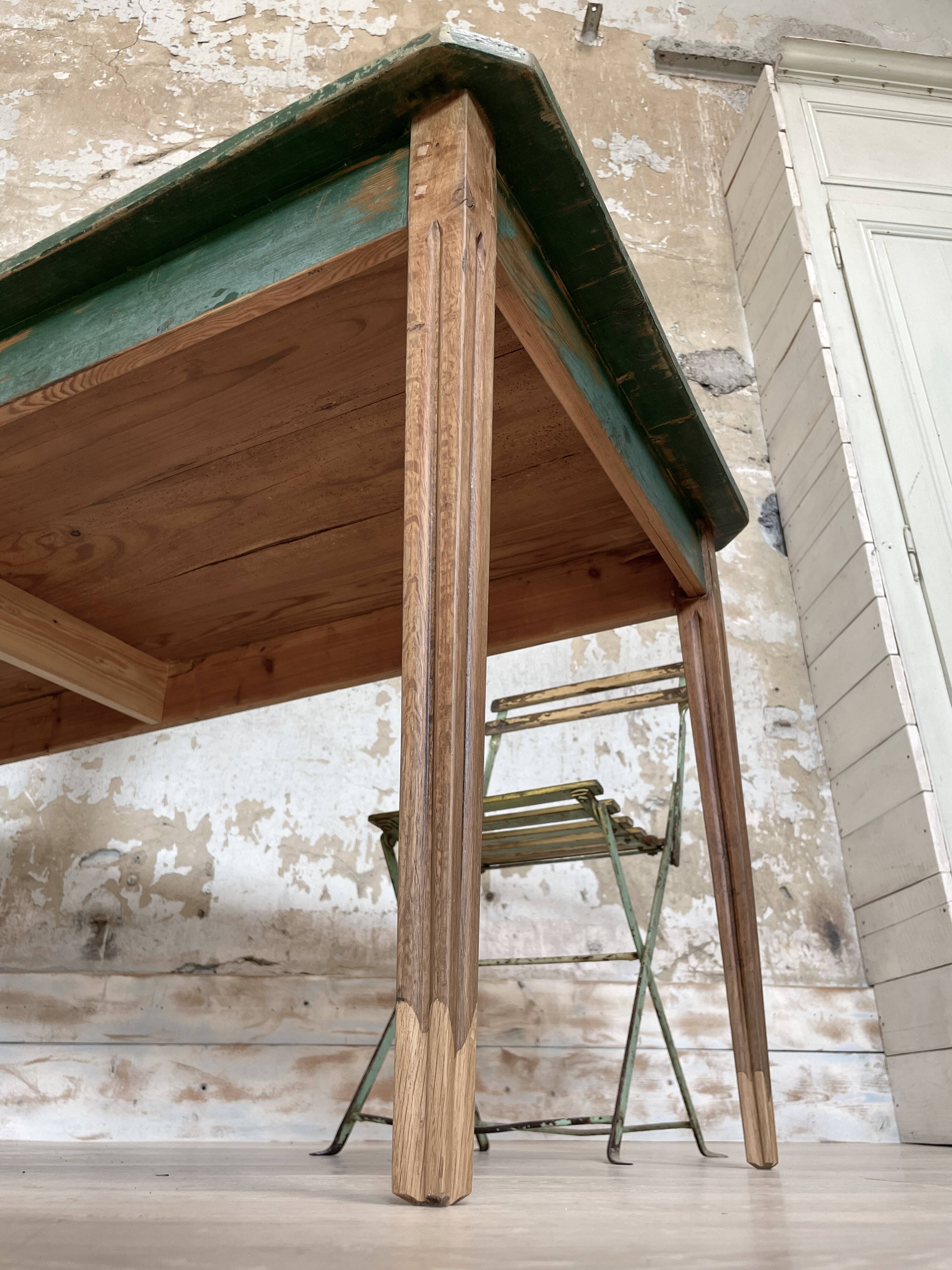 Vintage farm table with spindle legs.