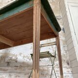 Vintage farm table with spindle legs.