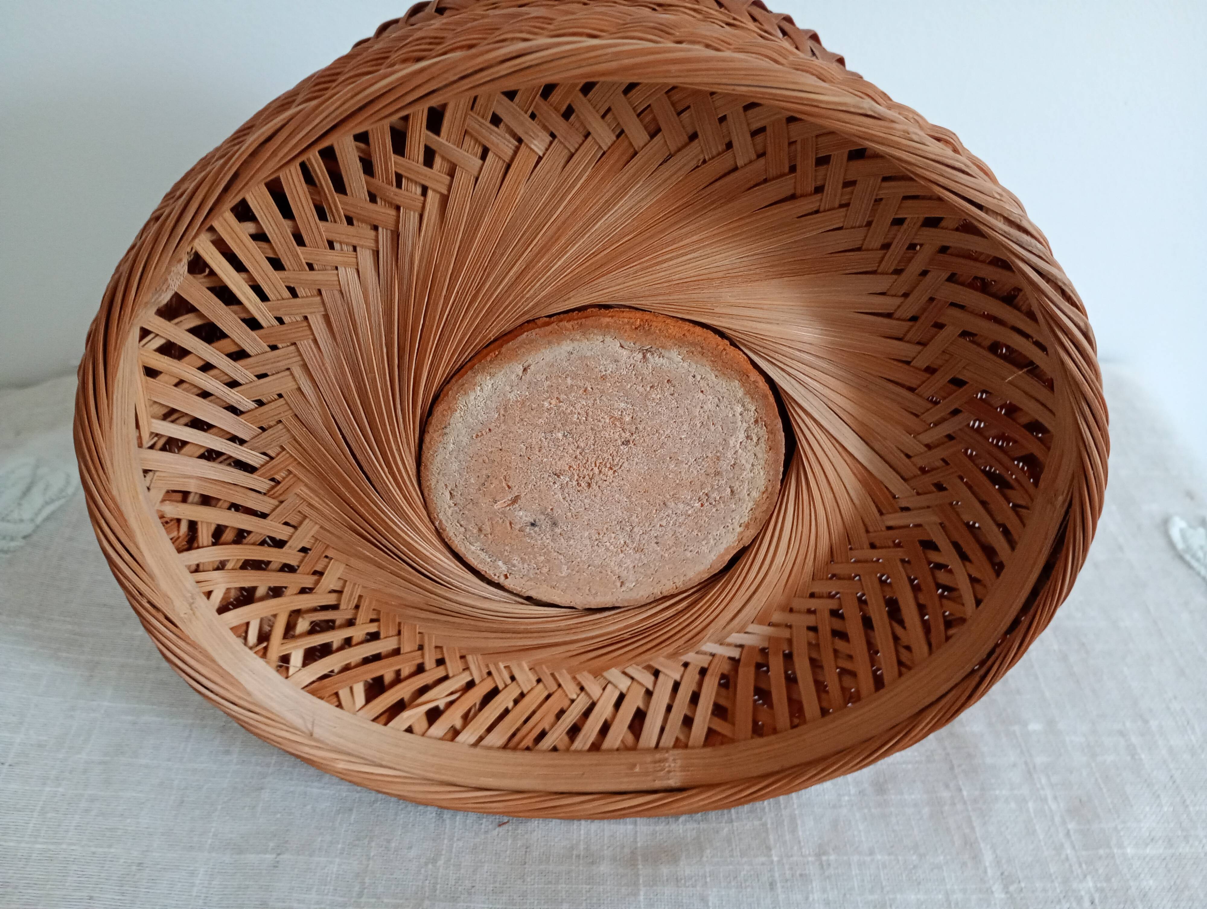 Woven bamboo basket and ceramic. Philippines.