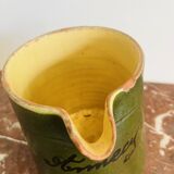 Antique Savoyard pottery pitcher in green with floral decoration
