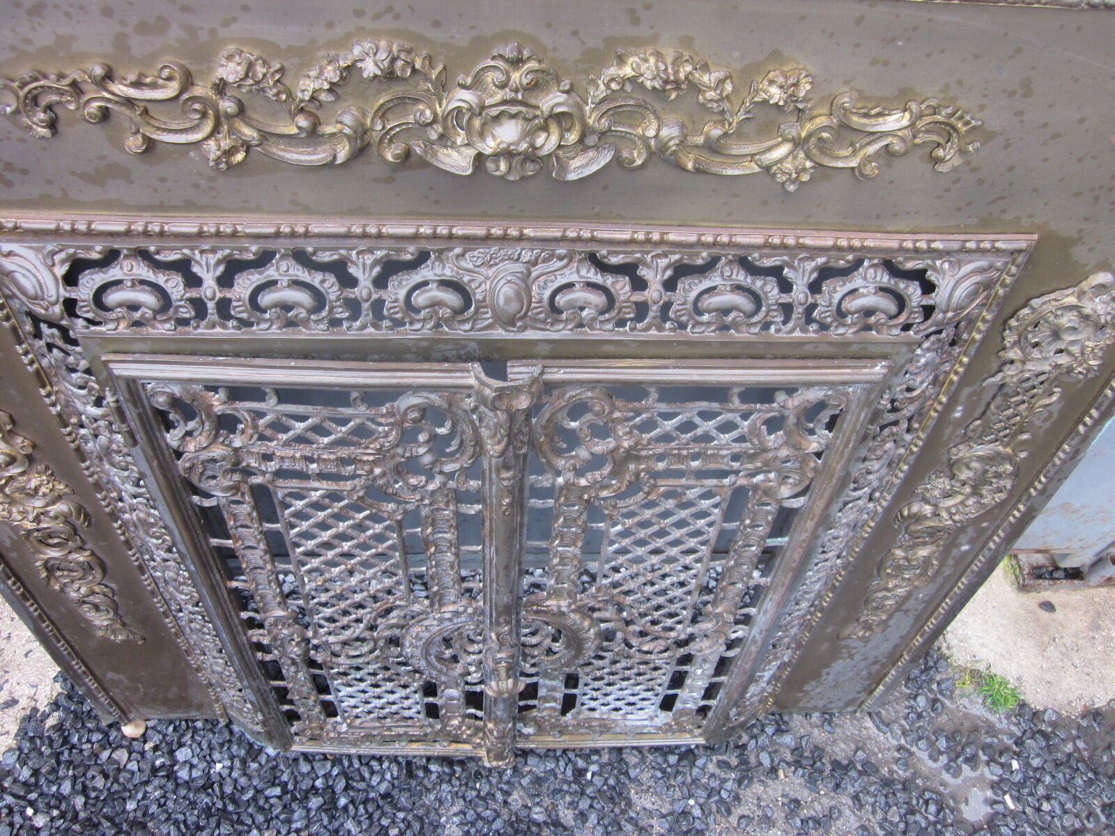 Front of the old fireplace all in bronze