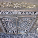 Front of the old fireplace all in bronze