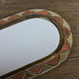 Decorated brass mirror.