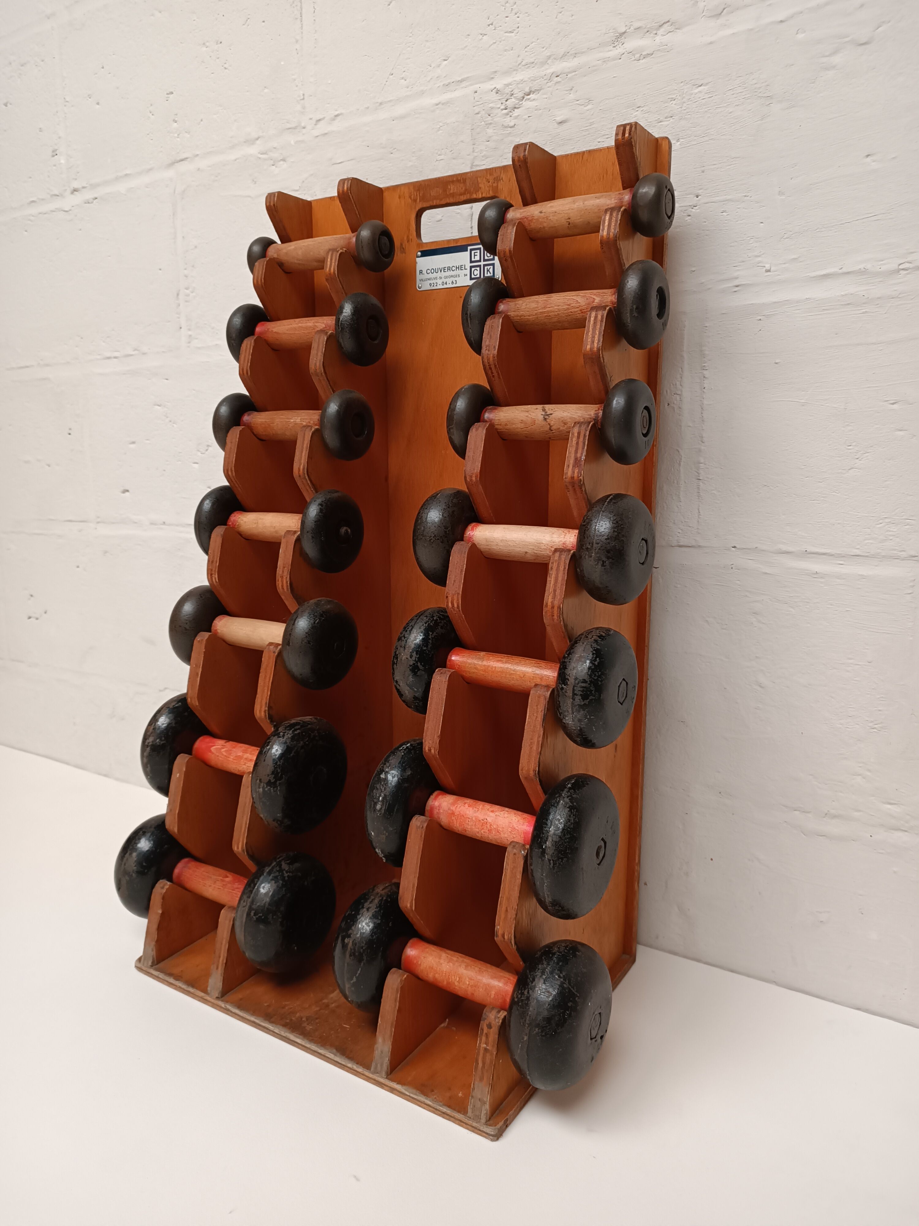 60s dumbbell wall display