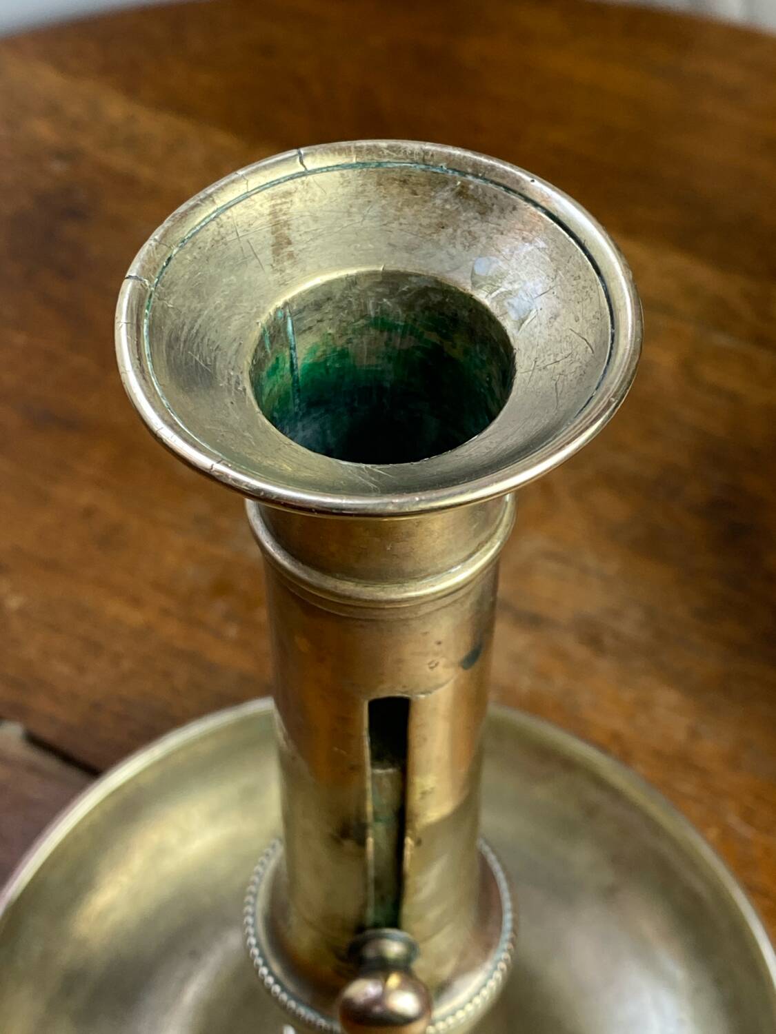 Push candle holder in brass