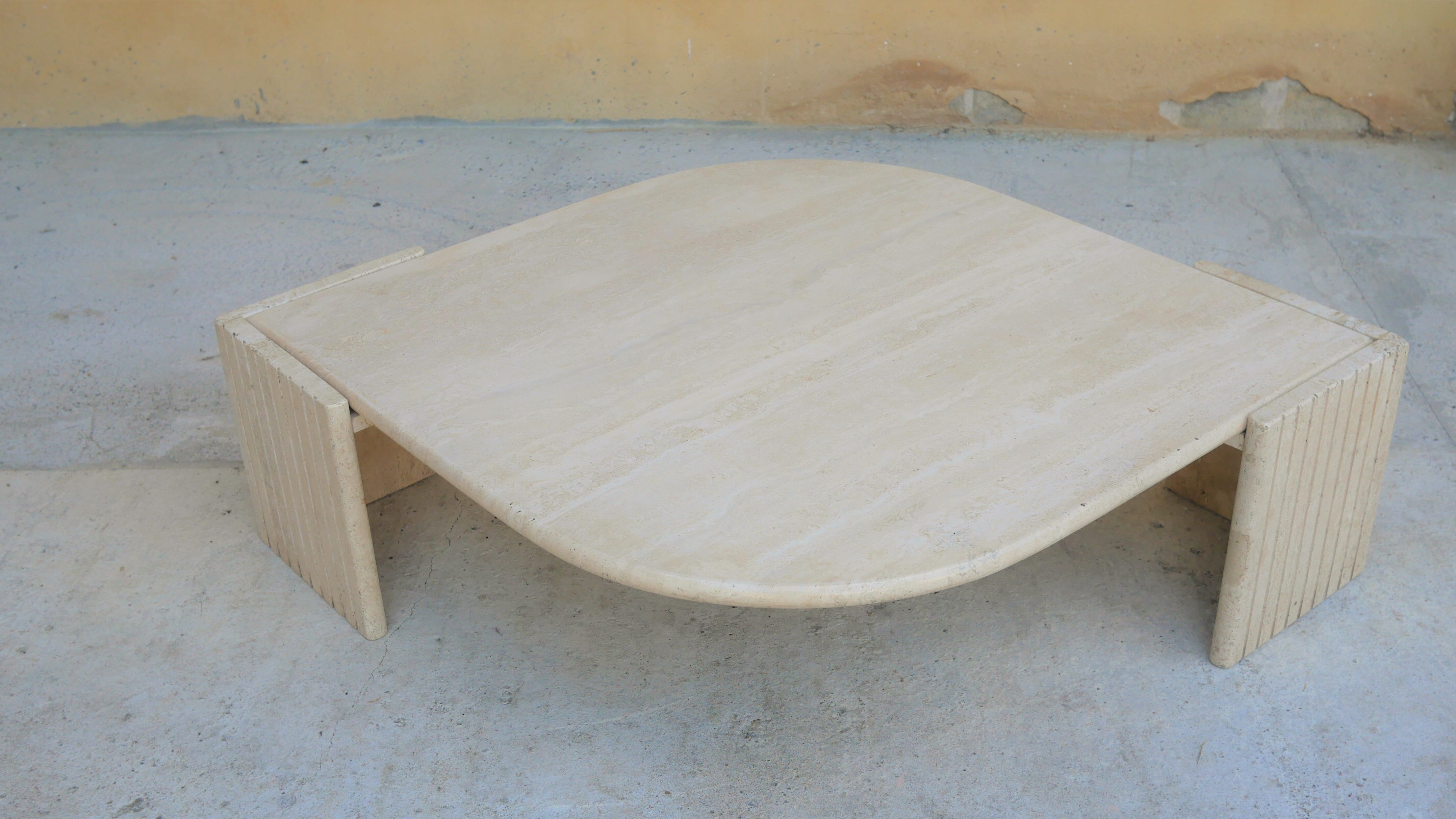 Coffee table in travertine by Roche Bobois editions