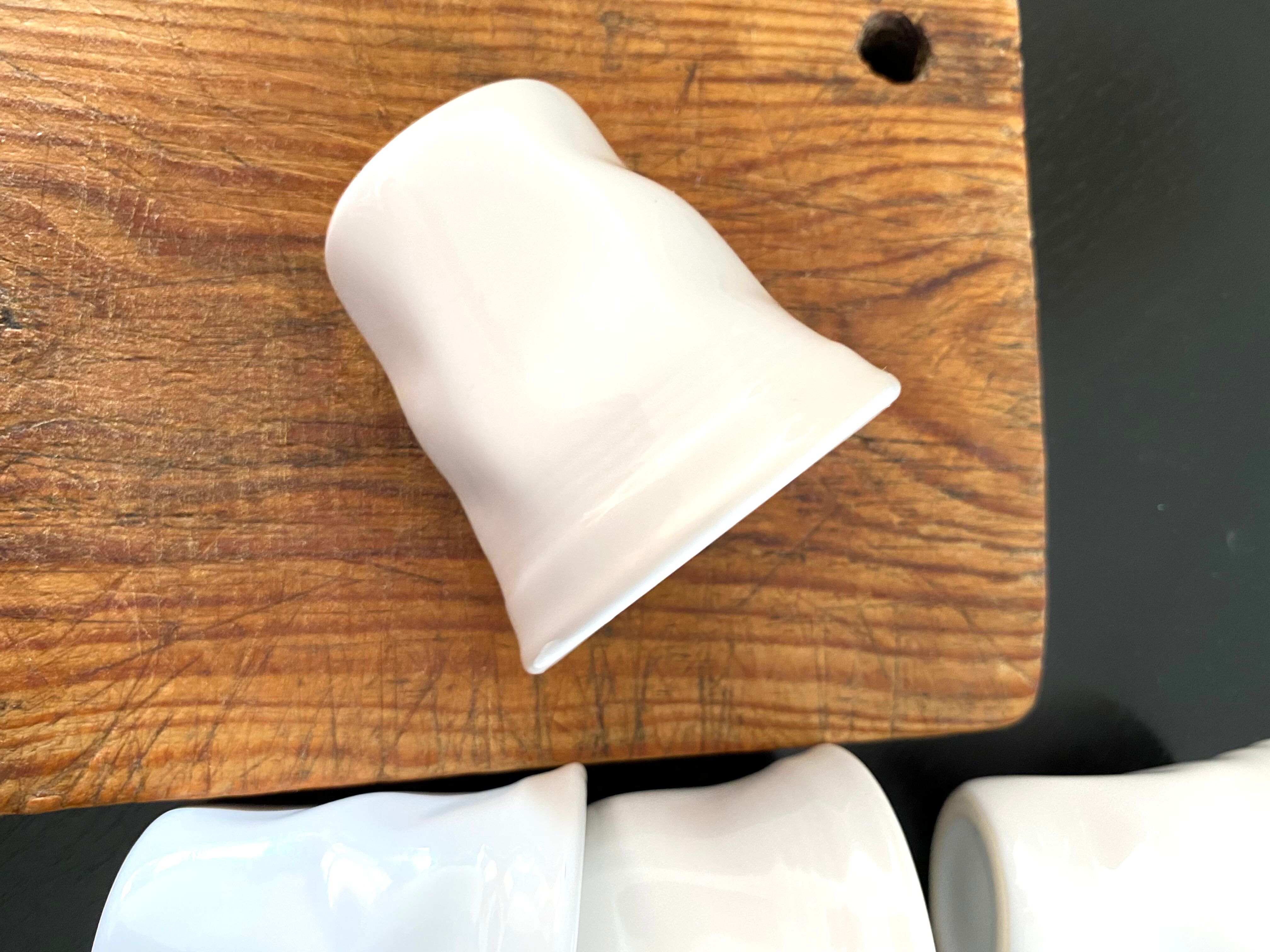 Six cups, glazed terracotta