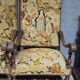 Pair of antique carved wooden armchairs – Figurative upholstery
