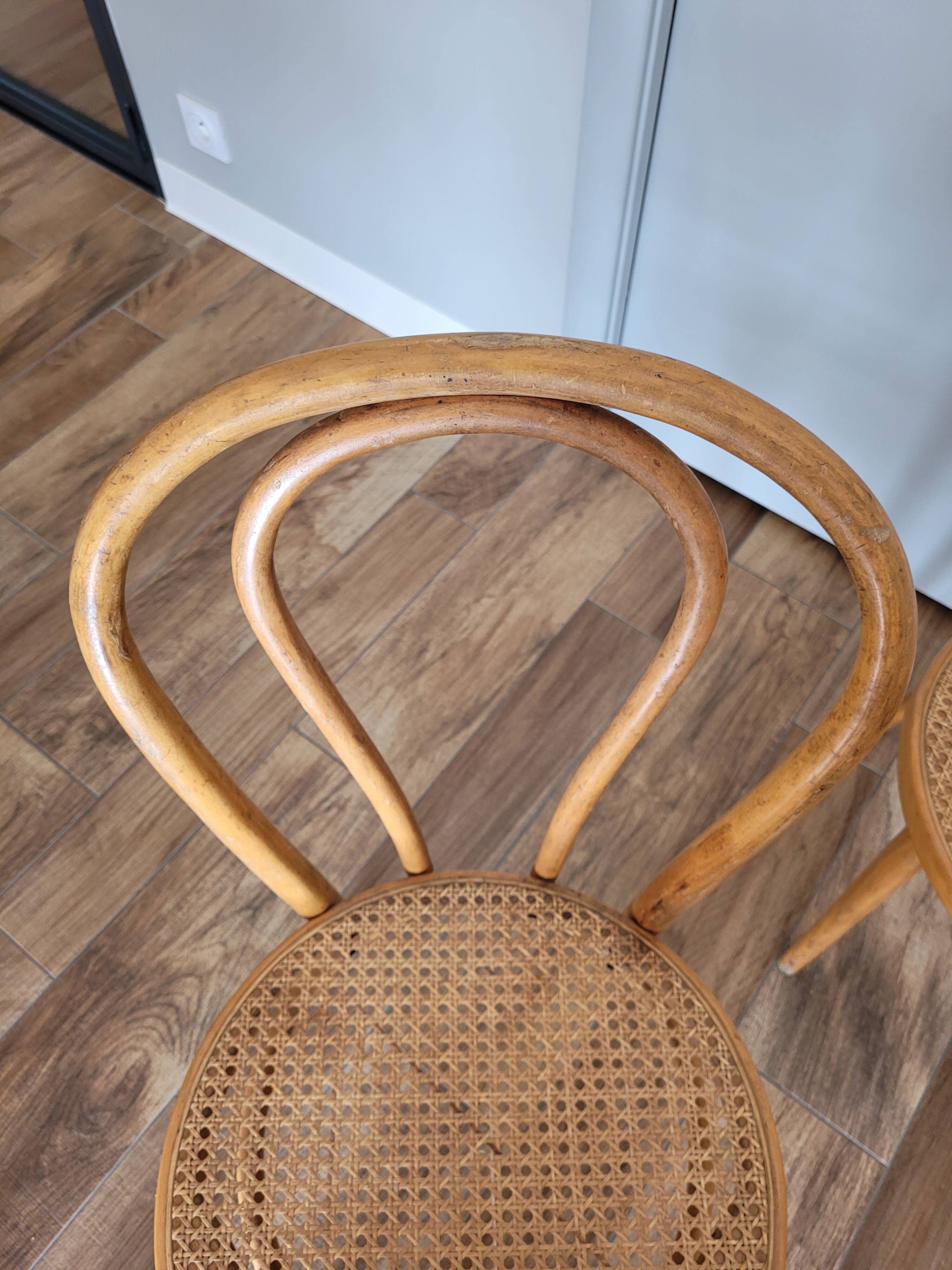 Four cane bistro chairs