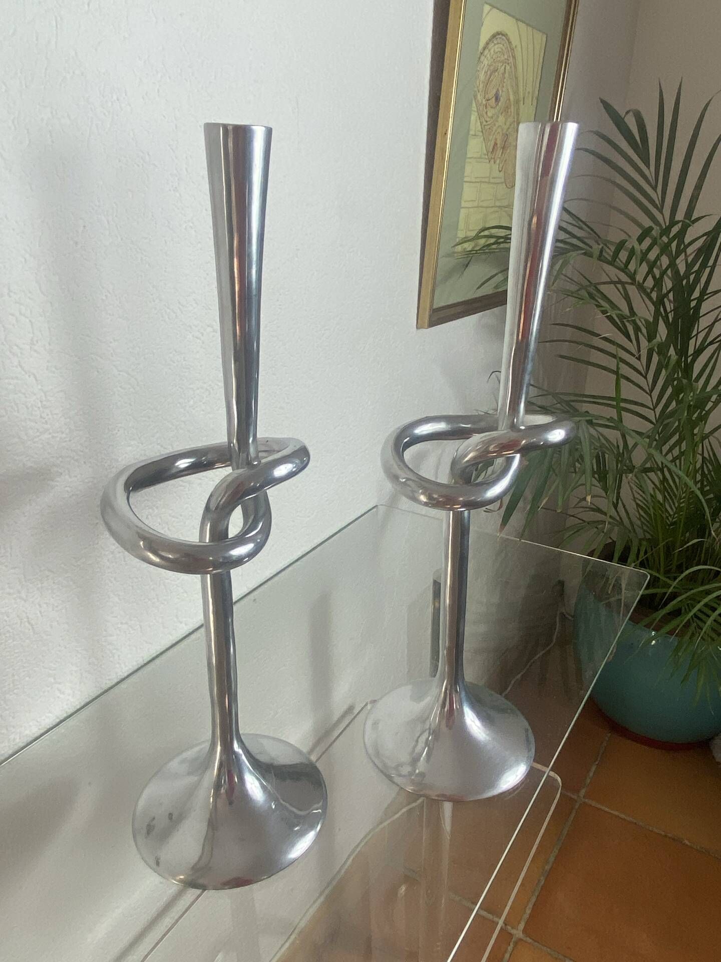 Pair of large aluminium bow candlesticks, Italy, 1970.