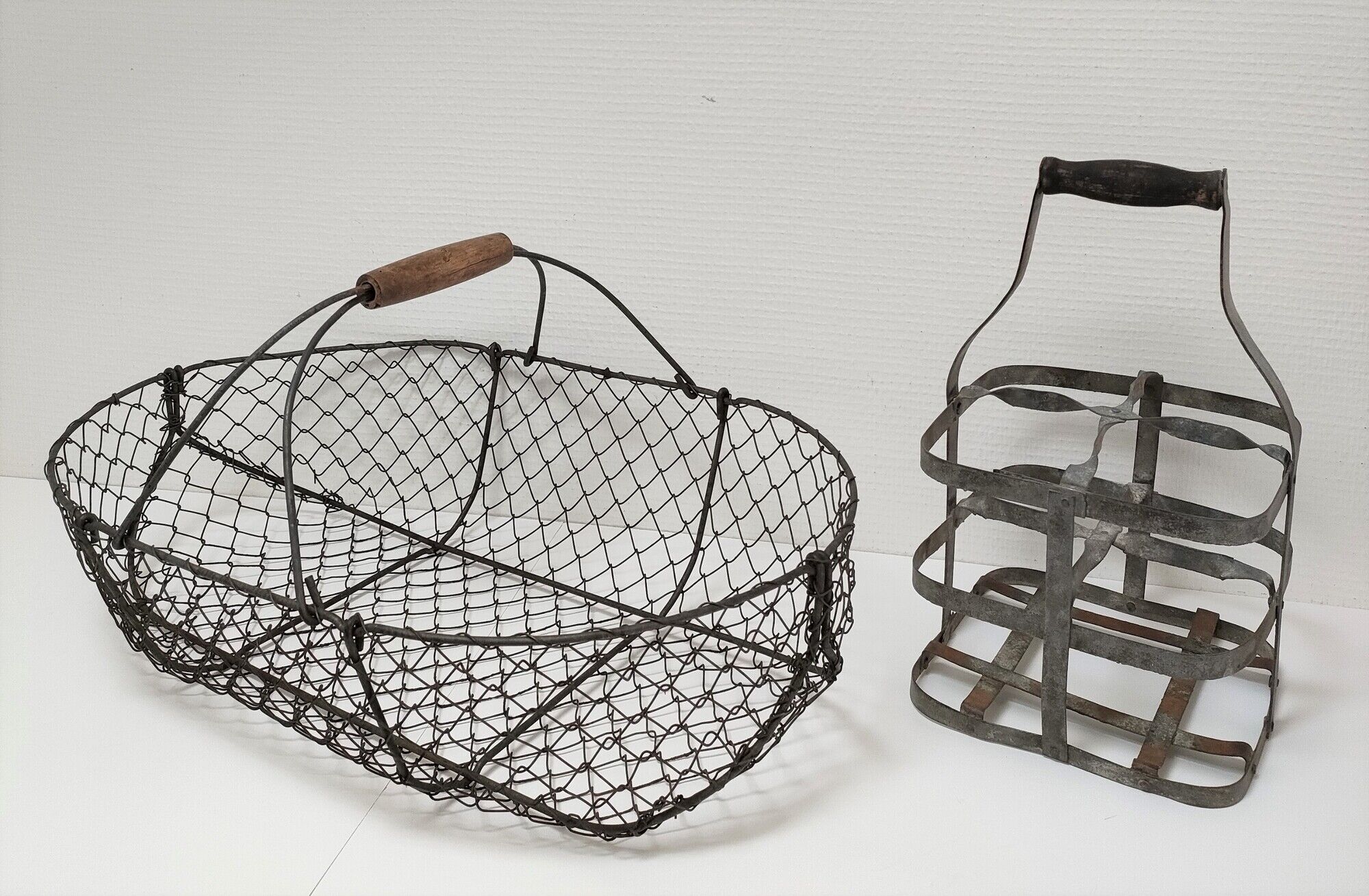 Two baskets metal and patinated wood early twentieth century