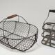 Two baskets metal and patinated wood early twentieth century