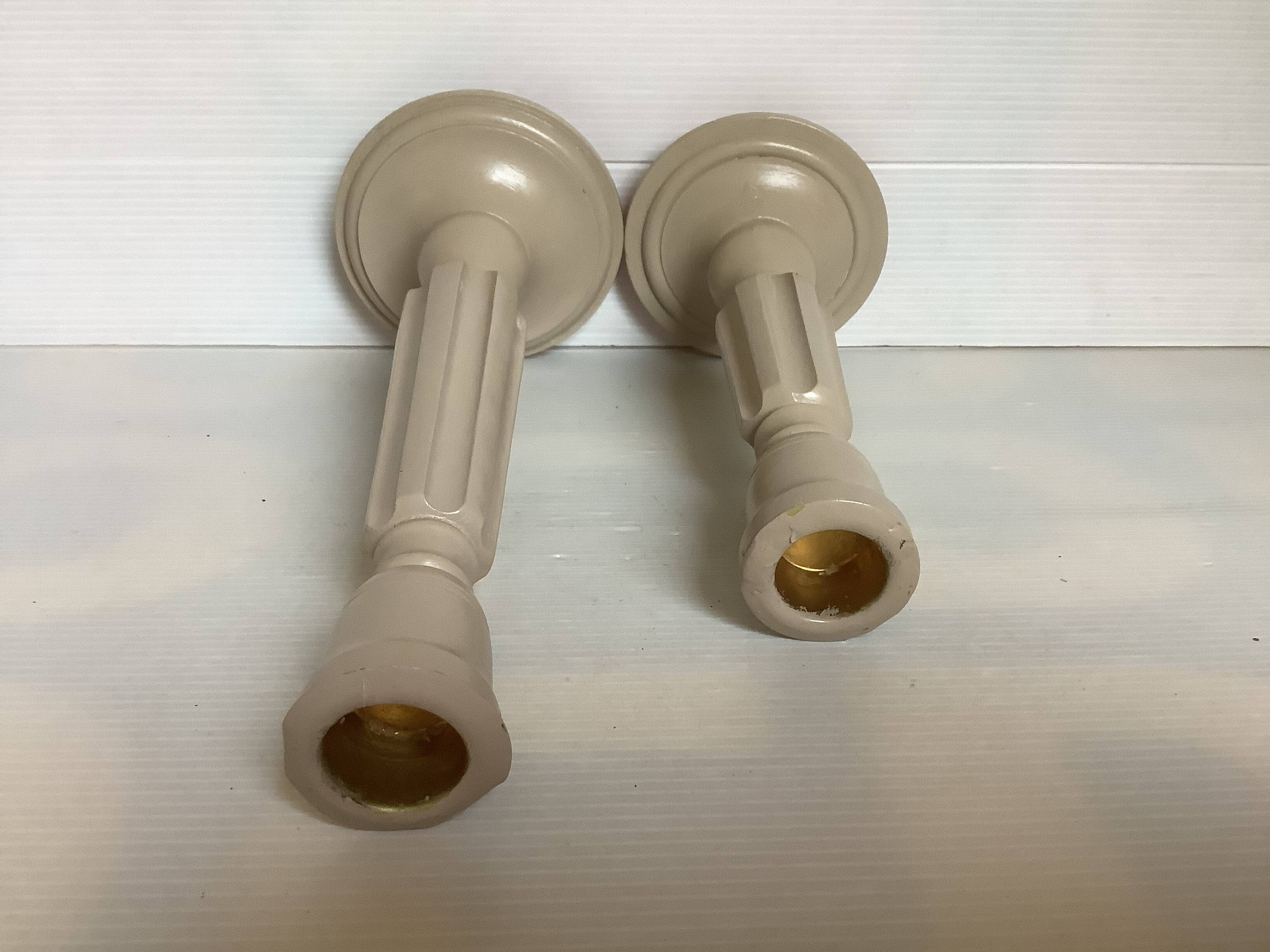 Pair of painted wooden candlesticks