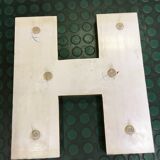 Golden sign letter h