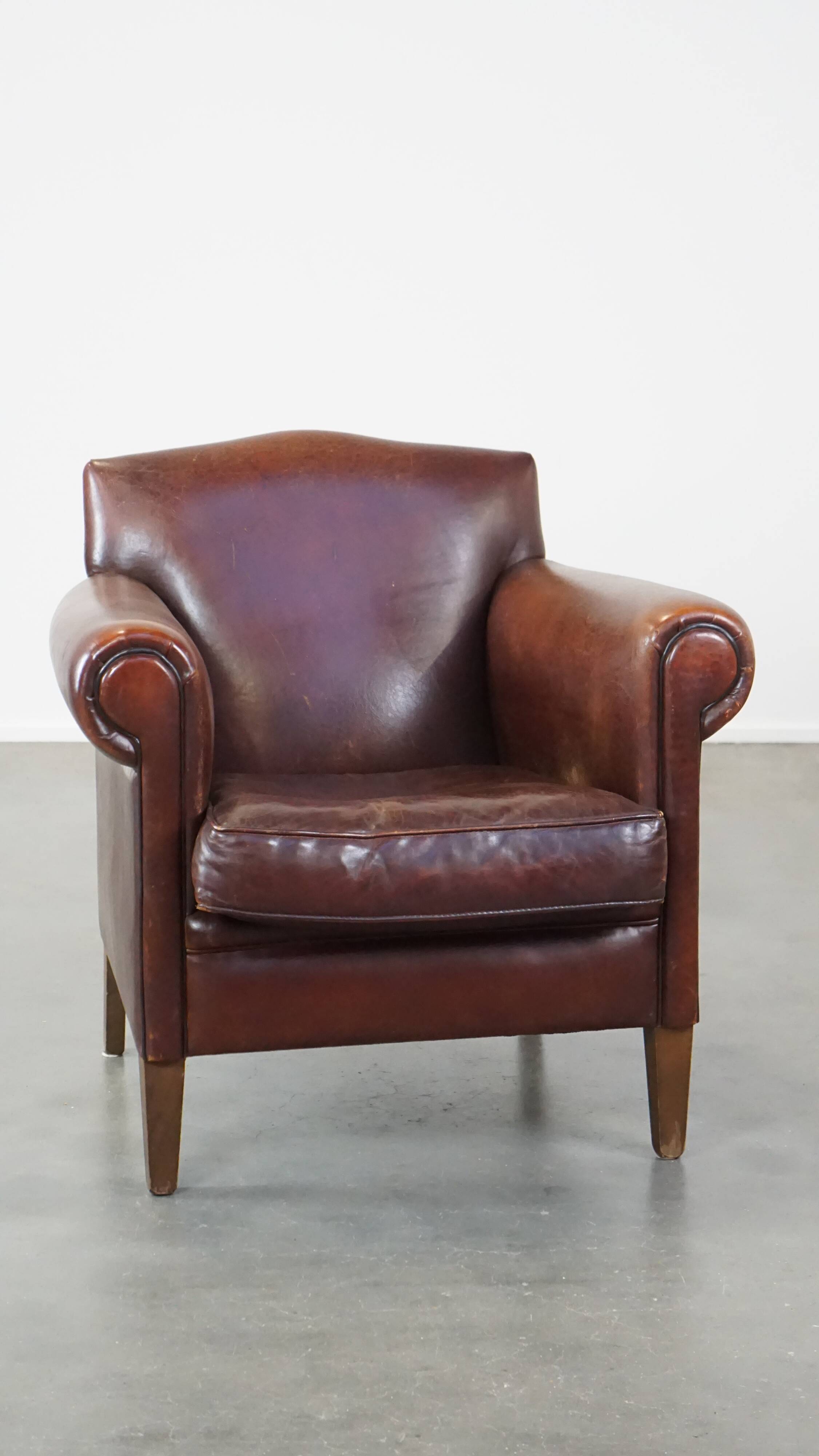 Design armchair made of sheep leather with a clean finish