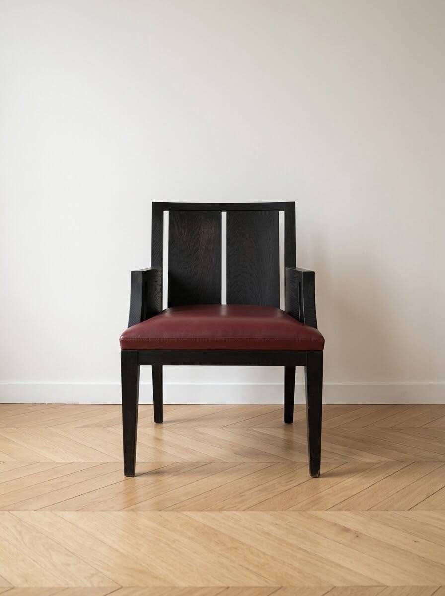 Designer armchair Philippe Hurel model Wallis in red leather and black beech.