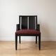 Designer armchair Philippe Hurel model Wallis in red leather and black beech.