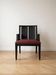 Designer armchair Philippe Hurel model Wallis in red leather and black beech.