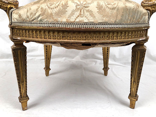 Carved and gilded wooden armchair in Louis XVI style, circa 1900