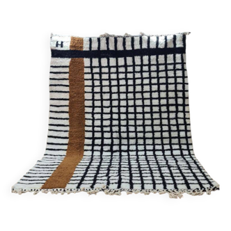 Tapis berbère Beni Ouarain en laine, design moderne à carreaux noir et blanc