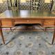 Louis XVI style flat desk in mahogany and green leather
