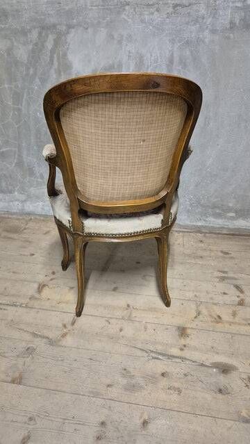 Vintage Louis XV style carved armchair with floral upholstery, 20th century, 90 × 58 cm