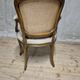 Vintage Louis XV style carved armchair with floral upholstery, 20th century, 90 × 58 cm