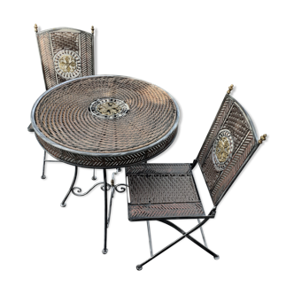 Garden furniture in rattan and wrought iron